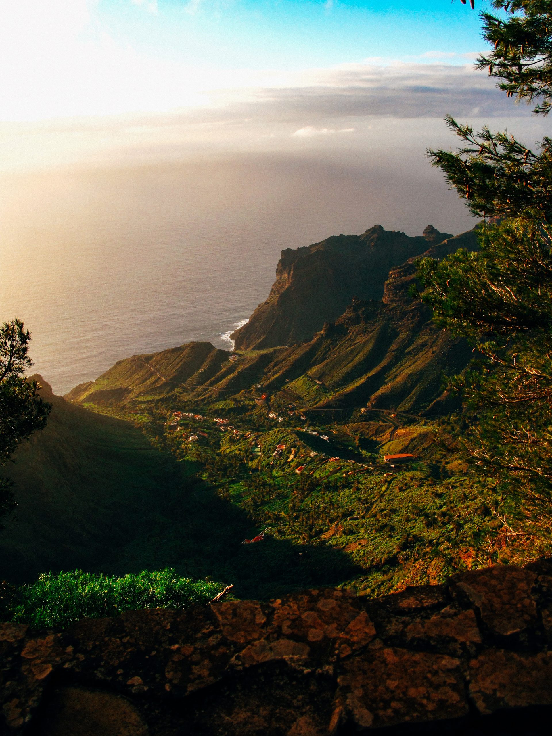 Green mountains and village near the sea in Madeira